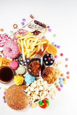 Sağlıksız ürünler. Yemek vücut, deri, kalp ve dişler için kötüdür. Fast karbonhidrat besin çeşitleri. 