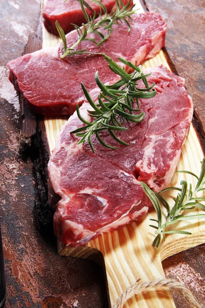 Steak raw. Barbecue Rib Eye Steak, dry Aged Wagyu Entrecote. Variety of Raw Black Angus Prime meat steaks Machete, Striploin, Rib eye, Tenderloin fillet mignon