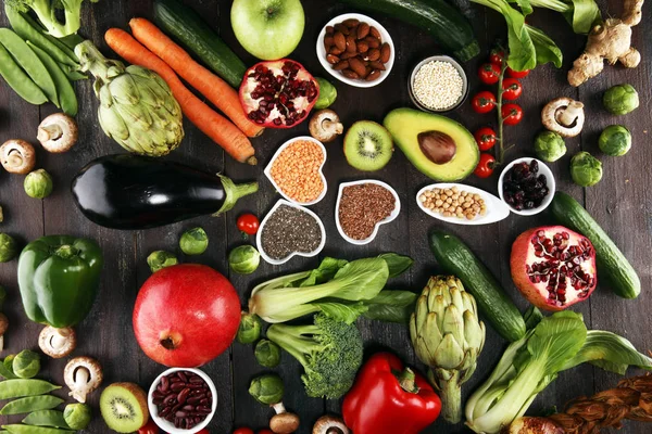 Healthy food clean eating selection. fruit, vegetable, seeds, superfood, cereals, leaf vegetable. veggie or vegan food