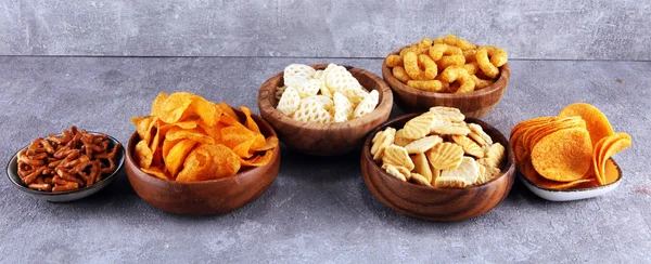 Salty Snacks Pretzels Chips Crackers Wooden Bowls Unhealthy Products Food — Stock Photo, Image