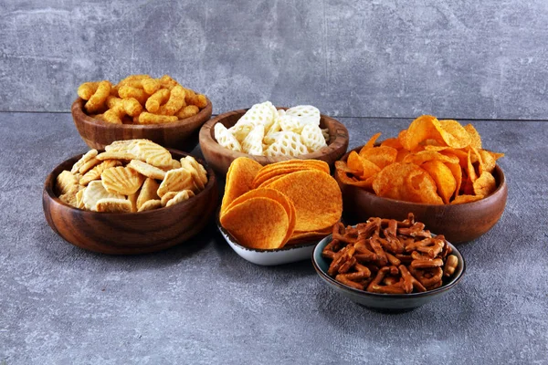 Salty Snacks Pretzels Chips Crackers Wooden Bowls Unhealthy Products Food — Stock Photo, Image