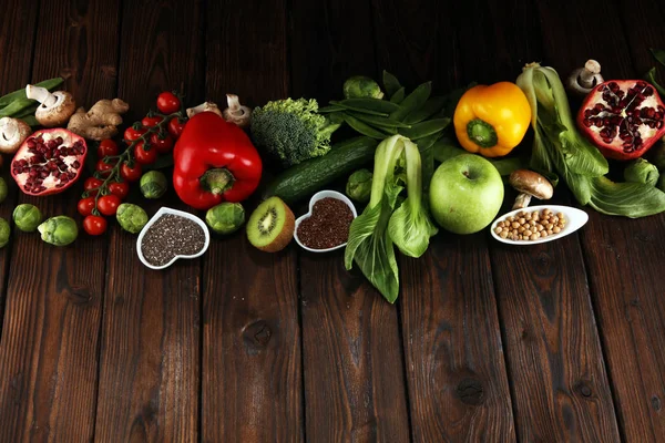Healthy food clean eating selection. fruit, vegetable, seeds, superfood, cereals, leaf vegetable. veggie or vegan food