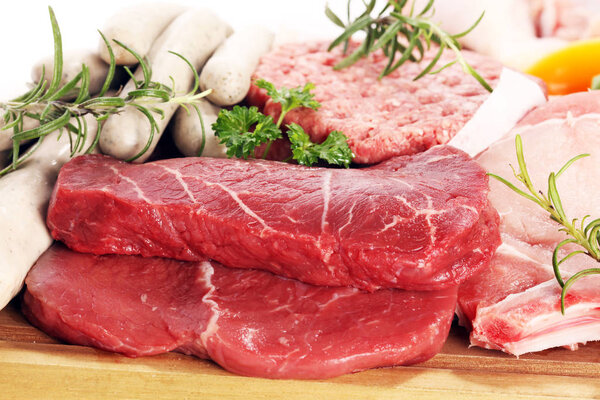 raw meat. Different types of raw pork meat, chicken and beef wit