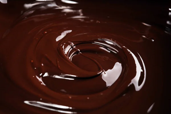 Melting chocolate, melted delicious chocolate for handmade prali — Stock Photo, Image