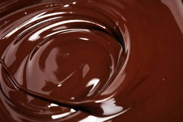 Melting chocolate, melted delicious chocolate for handmade prali — Stock Photo, Image