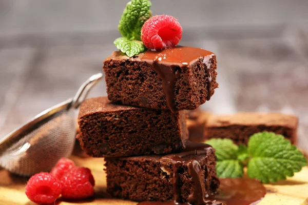 Chocolate brownie cake dessert with raspberry and spices on a ru — Stock Photo, Image