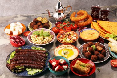 Middle eastern or arabic dishes and assorted meze, concrete rust clipart