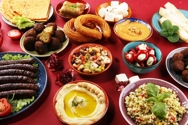 Middle eastern or arabic dishes and assorted meze, concrete rust — Stock Photo, Image