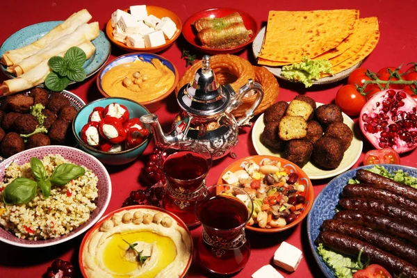 Middle eastern or arabic dishes and assorted meze, concrete rust — Stock Photo, Image