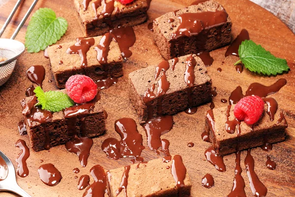 Chocolate brownie cake dessert with raspberry and spices on a ru — Stock Photo, Image