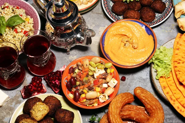 Middle eastern or arabic dishes and assorted meze, concrete rust — Stock Photo, Image