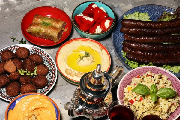 Middle eastern or arabic dishes and assorted meze, concrete rust