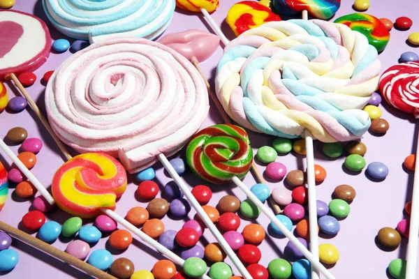 Lollipop snoepjes met gelei en suiker. kleurrijke matrix van differe — Stockfoto