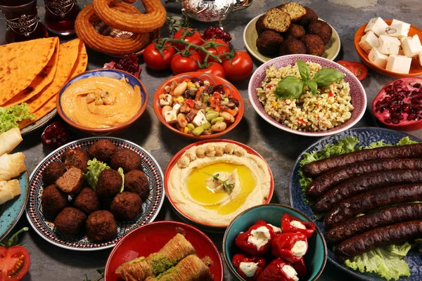 Middle eastern or arabic dishes and assorted meze, concrete rust