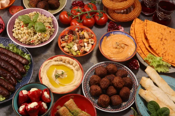 Middle eastern or arabic dishes and assorted meze, concrete rust — Stock Photo, Image
