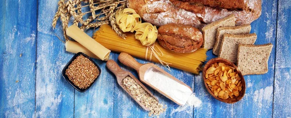 Whole grain products with complex carbohydrates on table — Stock Photo, Image