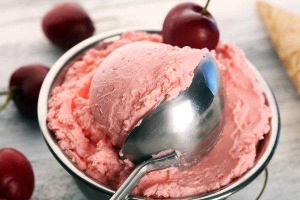 Cherry and vanilla ice cream scoop with fresh cherries and mint — Stock Photo, Image