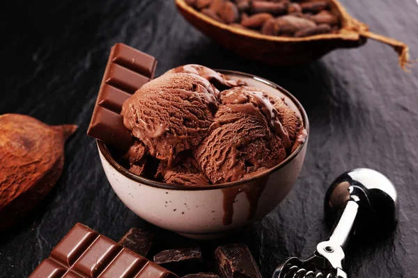 Chocolate coffee ice cream ball in a bowl. ice cream scoop