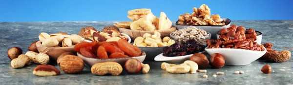 Composition with dried fruits and assorted healthy organic nuts — Stock Photo, Image