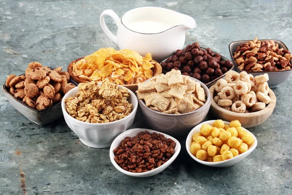 Cereal. Bowls of various cereals and milk for breakfast. Muesli — Stock Photo, Image