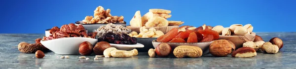 Composition with dried fruits and assorted healthy organic nuts — Stock Photo, Image