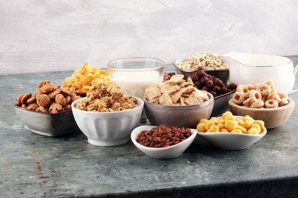 Cereal. Bowls of various cereals and milk for breakfast. Muesli — Stock Photo, Image