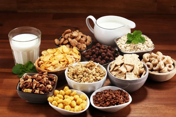 Cereal. Bowls of various cereals and milk for breakfast. Muesli Royalty Free Stock Photos