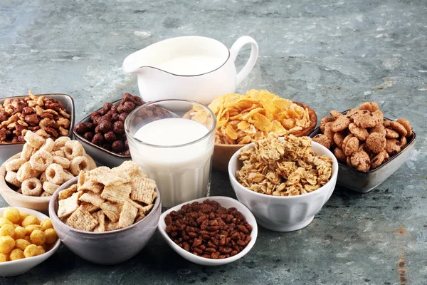 Cereal. Bowls of various cereals and milk for breakfast. Muesli Stock Picture