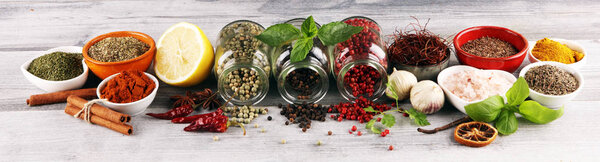 Spices and herbs on table. Food and cuisine ingredients with bas