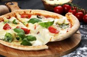 Картина, постер, плакат, фотообои "vegetarian italian pizza with tomatoes, mozzarella cheese and b", артикул 302940470