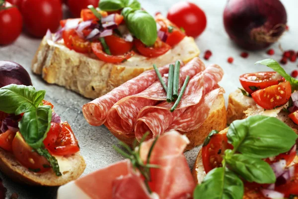 Assorted bruschetta with various toppings. Appetizing bruschetta — Stock Photo, Image