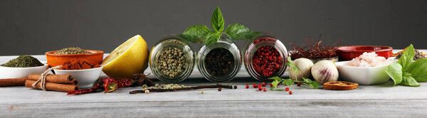 Spices and herbs on table. Food and cuisine ingredients with bas