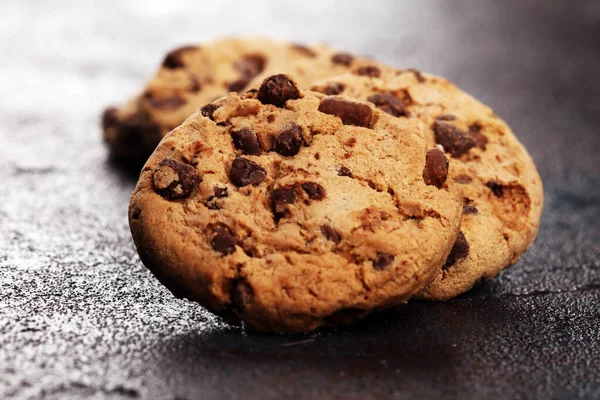 Chocolate cookies on wooden table. Chocolate chip cookies shot o — Stock Photo, Image