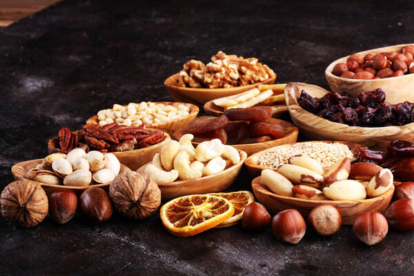 Composition with dried fruits and assorted healthy organic nuts.
