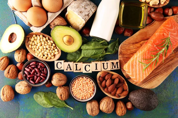 Best Calcium Rich Foods Sources. Healthy eating. Foods rich in calcium such as bean, almonds, hazelnuts, spinach leaves, cheese, and milk