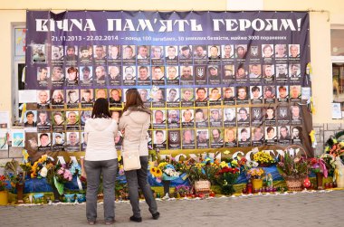 LUTSK, UKRAINE - SEPTEMBER 24: a mother and daughter mourn the deaths of the 