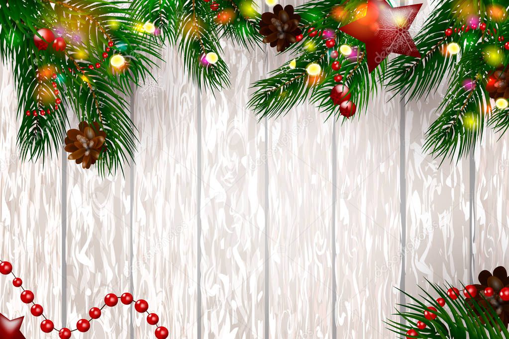 Christmas wooden background with fir branches and snow.