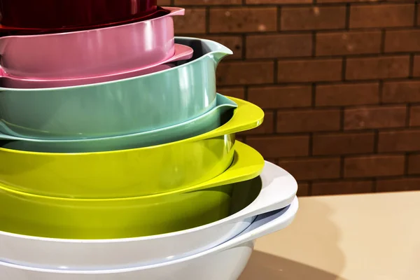 Multi-colored bowls stacked together