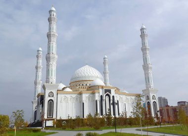 The Hazrat Sultan Mosque in Astana with blue cloudy sky Kazakhstan clipart