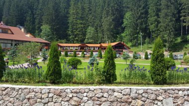 Hotel Lacul Rosu , Red Lake. Bicaz Natural Park. Romania. clipart