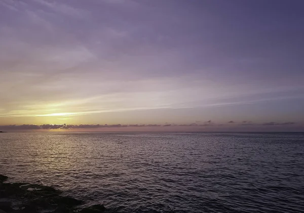 Dramatic sunset over the water on Cuban beach