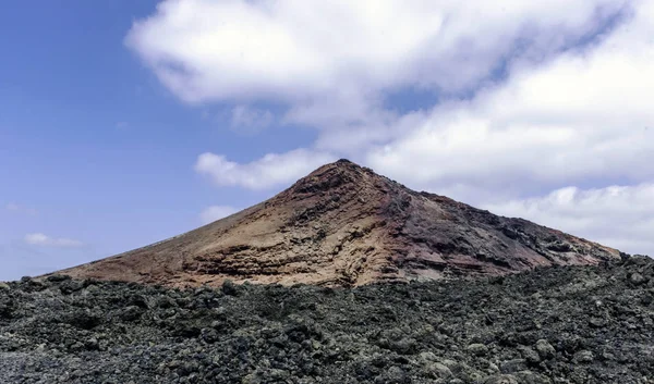 Red volcano in Timanfaya National Park, Lanzarote, Canary Islands, Spain