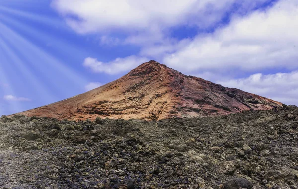 Red volcano in Timanfaya National Park, Lanzarote, Canary Islands, Spain