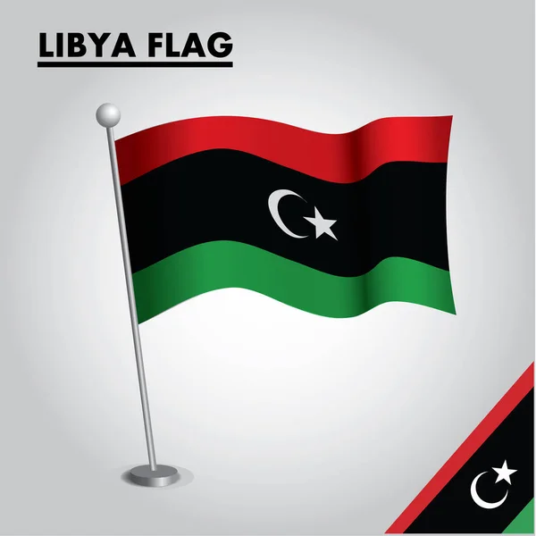 Bir direk üzerinde Libya ulusal bayrağı