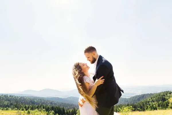 Groom Embraces Bride Look Each Other Wind Blows Hair Bride — Stock Photo, Image