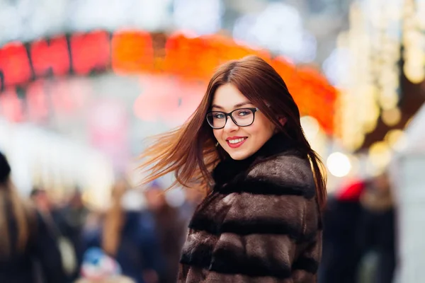 Girl Fur Coat Glasses Waving Her Hair Looking Camera Lens — Stock Photo, Image