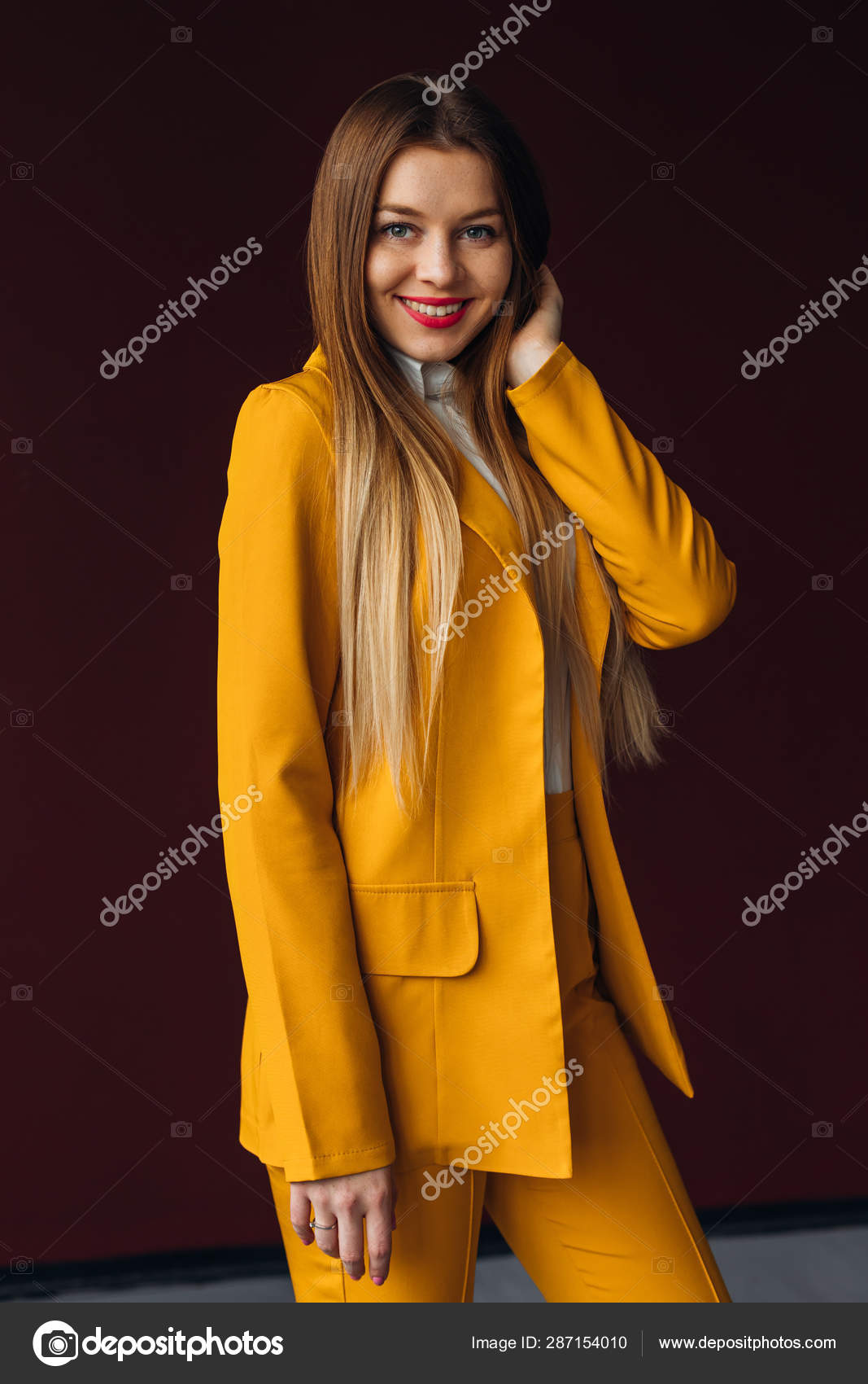 yellow trouser suit
