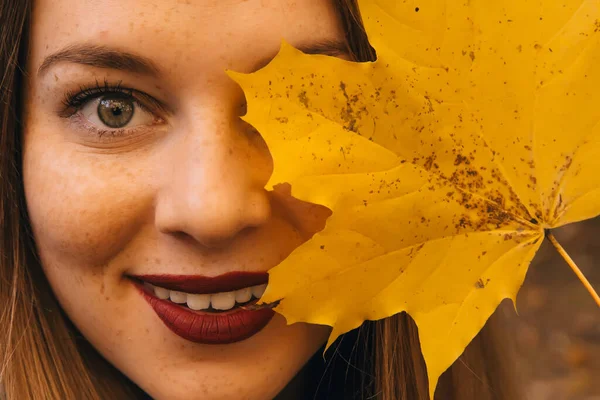 Autumn Woman Holding Yellow Maple Leaves Hiding Her Eye — Stock Photo, Image