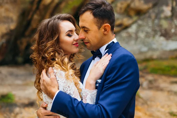 Close Newlyweds Sensual Embrace Background Rocks — Stock Photo, Image