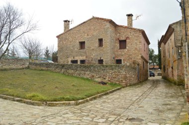 Medinaceli köy bizim yürüyüş güzel taş evler. Mimari, tarih, seyahat. 19 Mart 2016. Medinaceli, Soria, Castilla Leon, İspanya.